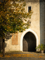 Entrance of the church of Spitz an der Donau on a sunny day in autumn