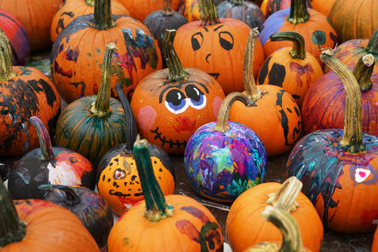 group of colorful painted pumpkin for Halloween in autumn