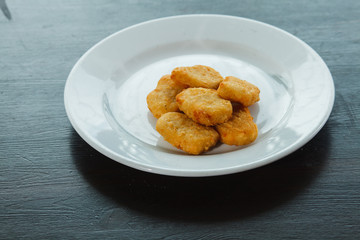 fried squid rings on a plate