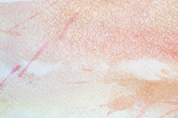 spot of a soft pink watercolor with orange background