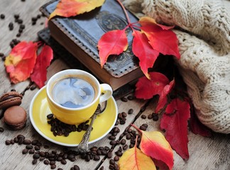 Autumn leaves, book and cup of black coffee. Background for website, bloggers, social media. Fashion flat lay