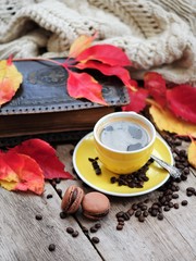 Autumn leaves, book and cup of black coffee. Background for website, bloggers, social media. Fashion flat lay