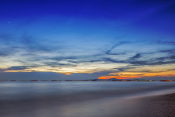 Fototapeta na wymiar Sea sky cloud in sunset long exposure