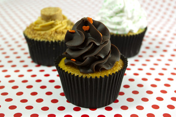 Cupcakes over colorful background
