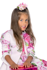 Fashionable little girl in a dress