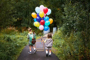 Kids walking green park