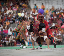 Masked dancers at Bhuddist festival connect