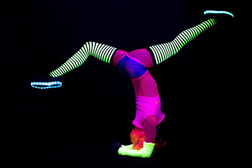 yoga insturtor in fluorescent costume