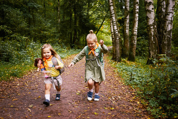Kids walking green park