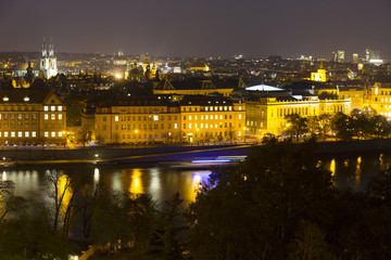 Fototapeta na wymiar Night Prague City with its Cathedrals, Towers and Bridges, Czech Republic