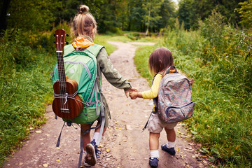 Kids walking green park