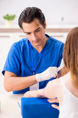 Young patient during blood test sampling procedure  