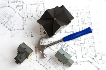 Construction Plans, House Models And Hammer