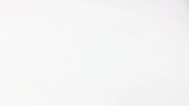 human finger traces the outline of the small circle on white table 