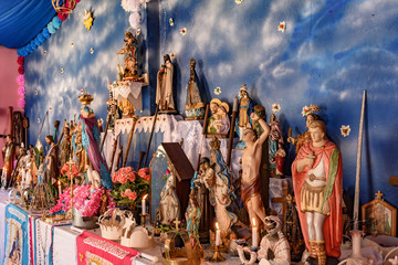 Brazilian religious altar mixing elements of umbanda, candomblé and catholicism in the syncretism...