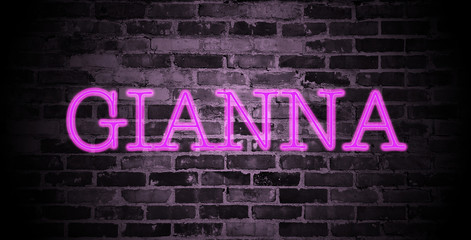 first name Gianna in pink neon on brick wall