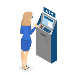 Woman using ATM machine and gets money