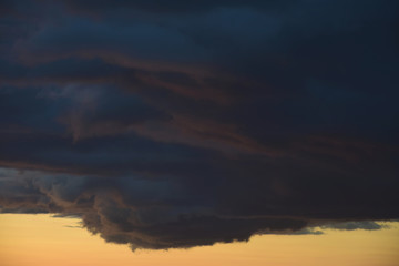 Fototapeta na wymiar Dark cloud formation at dusk