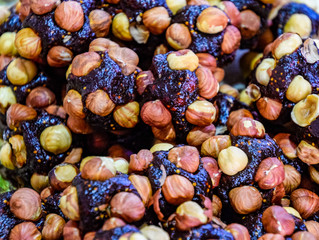 Slices of marmalade with hazelnuts. Hazelnut with sweets