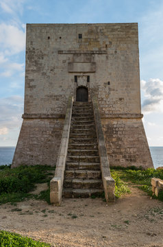Mgarr Ix-Xini Bay Tower Gozo. Malta. Horizontal at sunset