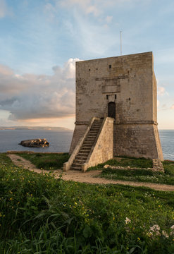 Mgarr Ix-Xini Bay Tower Gozo. Malta. Horizontal at sunset
