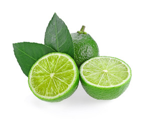 limes with leaf on white background