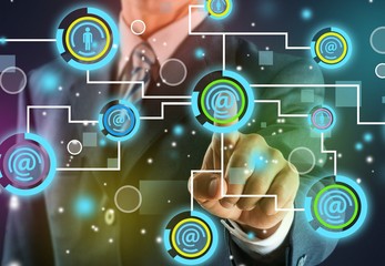 Man touching business elements on screen