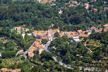 Fototapeta na wymiar The Palace of Sintra as seen from the Moorish castle on the top of the hill. Sintra. Portugal