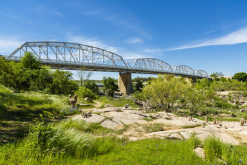 The rustic Highway 71 bridge over the Llano River in the small Texas Hill Country town of LLano.