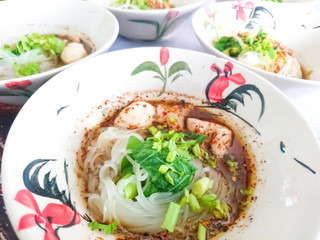 Close up Thicken Soup Noodles Sliced Pork with Pork Ball / thai food