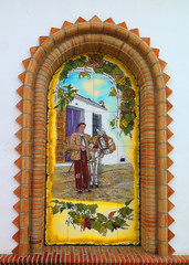 Colorful wall mounted mural on old market building © johnnywalker61