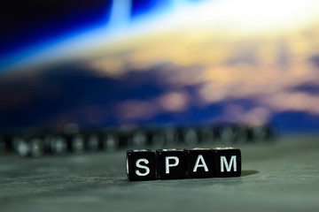 Spam on wooden blocks. Cross processed image with bokeh background