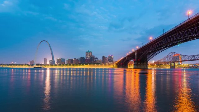St. Louis, Missouri, USA downtown skyline on the river at dawn.