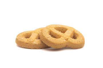 one side of two butter cookies on white background