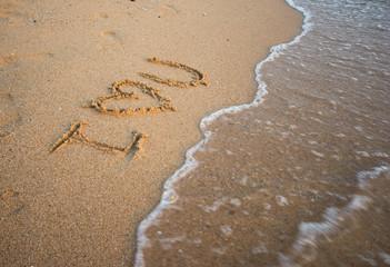 love message written in sand