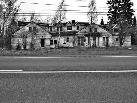 Black And White House Along The Road