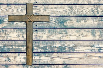 Holy wooden cross isolated on white background