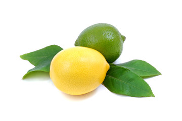 Lemon and lime with leaves isolated on white background.