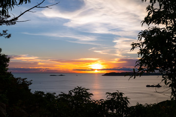 Fototapeta na wymiar Beautiful blazing sunset landscape at black sea and orange blue sky