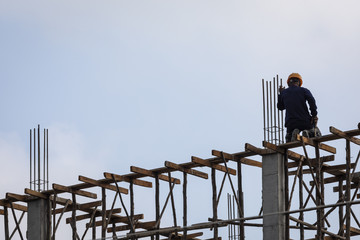 construction worker working on a risk building