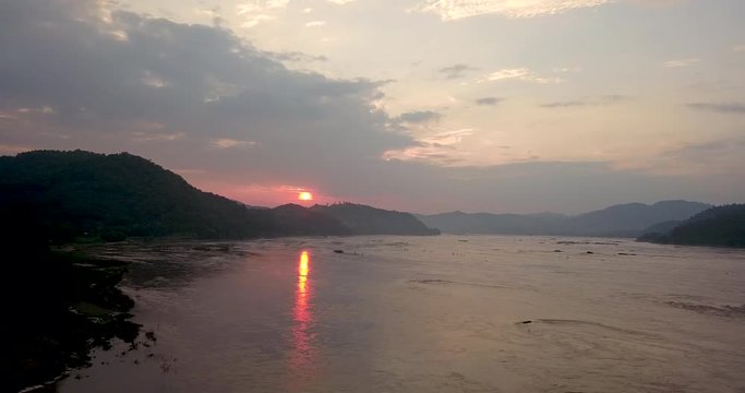 Aerial view Mekong river sunset water stream from China Laos Myanmar Thailand and Cambodia to sea