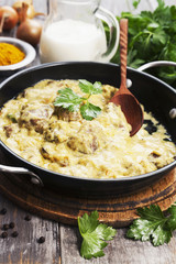 Chicken liver in creamy sauce with curry