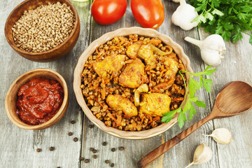 Buckwheat porridge with meat and tomato sauce