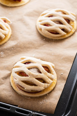 Cooking process of galetta, biscuit with apples on paper background. Apple pie with cinnamon.