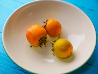 Freshly harvested persimmon