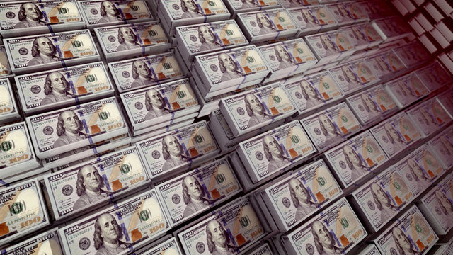 Bundles of 100 dollar bills in a stongbox