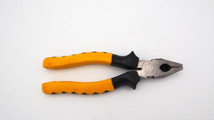 Obraz premium Pliers on white background top angle view, tool or equipment for repair ,maintenance for worker construction or at home .