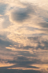 blue and gold sky background with white cloudy , twilight in the evening .