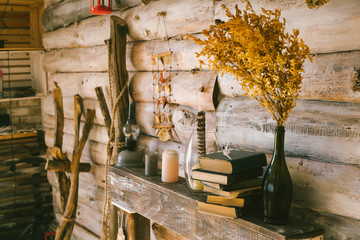 books  and oil lamp on the table. wooden background. vintage.autumn. © Volodymyr Matskevych