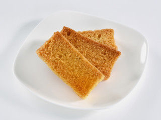 Cake Rusk, Crunchy, crispy dry cake biscuit, also known as cake toast.  